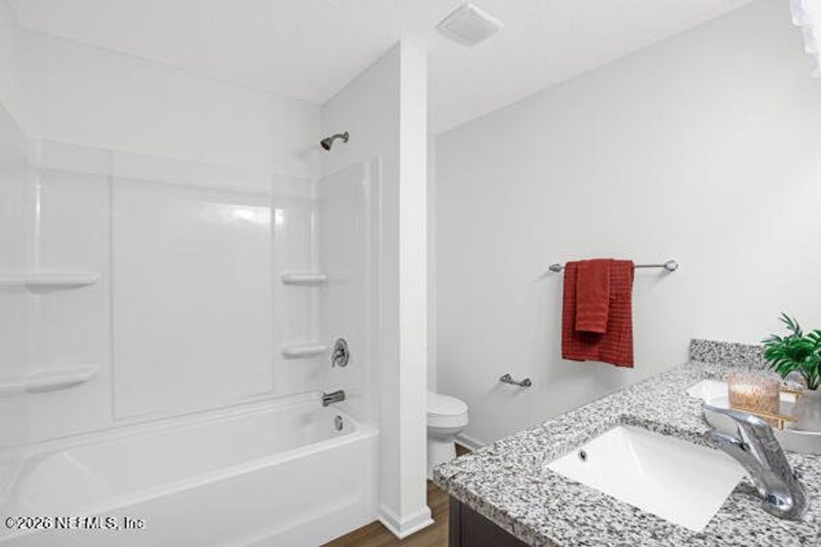 Furnished interior view inside a new home in , Satsuma (Image 5).