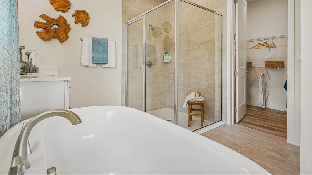 Oleander Primary Suite En Suite Bath by DRB Homes in Ardisia Park in New Smyrna Beach, FL