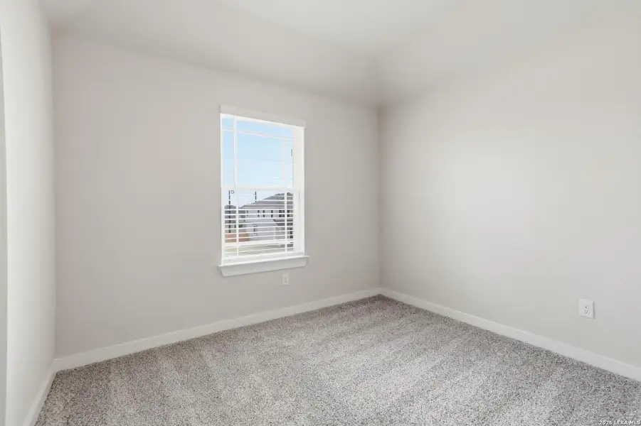 Spacious, unfurnished interior of a new home in Hunters Ranch, San Antonio (Image 23).