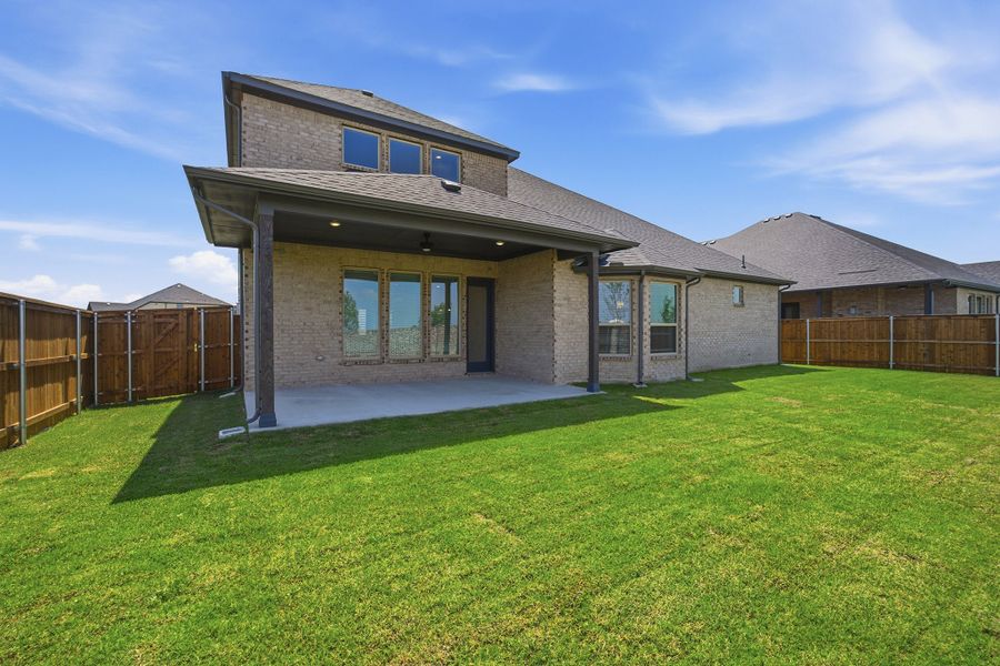 Exterior details and patio area of a home in Green Meadows, Celina (Image 4).