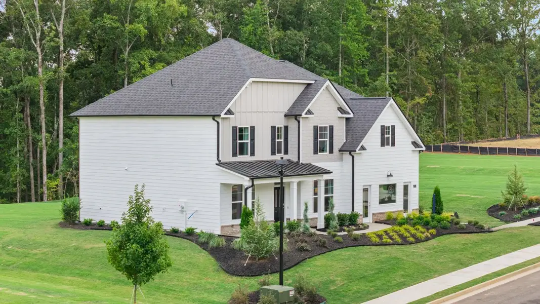 Representative exterior photo of a completed home built from the Savannah by D.R. Horton in Heritage Pointe, Senoia, GA (Image 2).