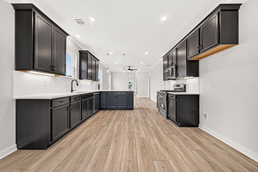 Furnished interior view inside a new home in Aldeana, Bonney (Image 11).