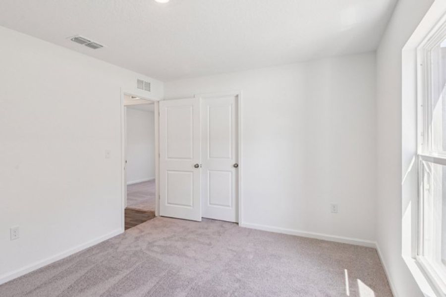 A room with white doors.