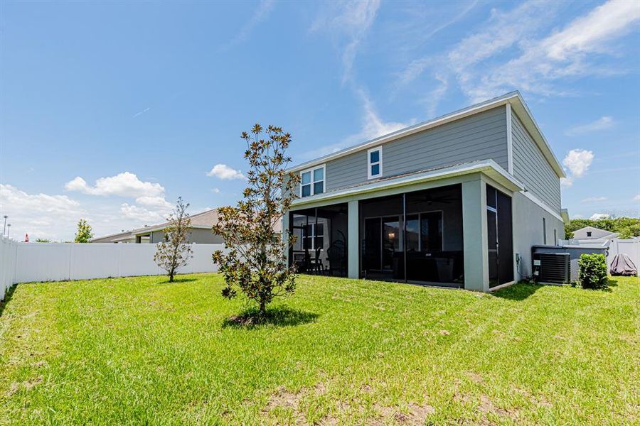 Front exterior of a new home in Seasons at Lakeside Forest, Tavares, FL, highlighting curb appeal (Image 26).