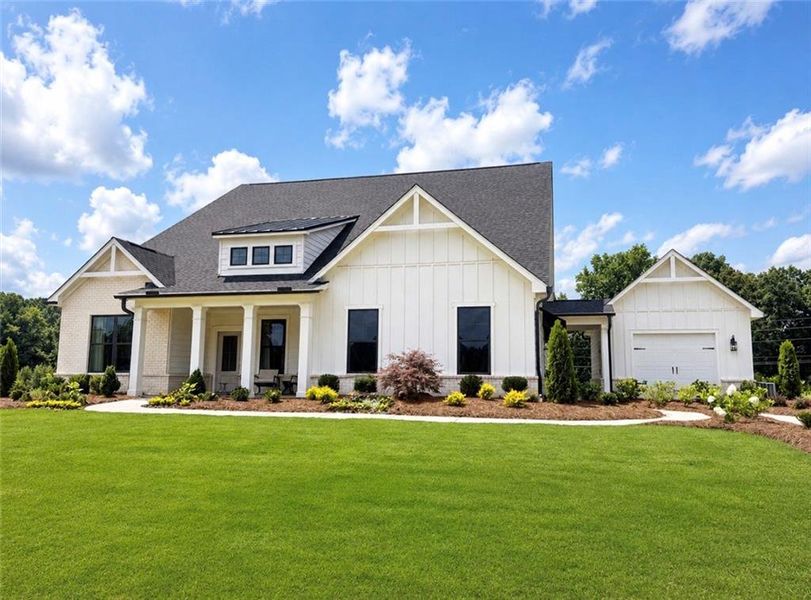 Front exterior of a new home in Echo Grove, Cumming, GA, highlighting curb appeal (Image 1). Front exterior of a new home in Echo Grove, Cumming, GA, highlighting curb appeal (Image 1).
