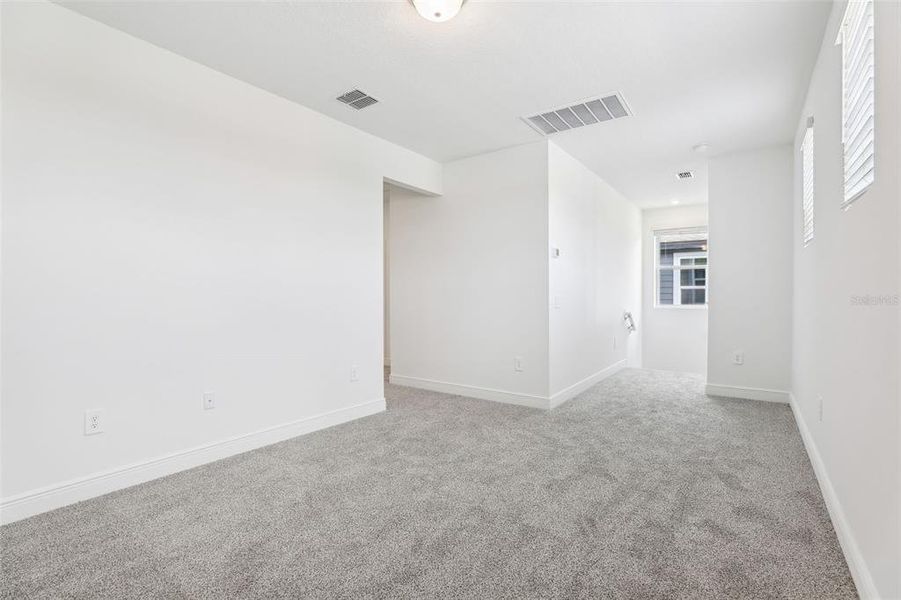 Spacious, unfurnished interior of a new home in Cyrene at Minneola - Villas, Minneola (Image 20).