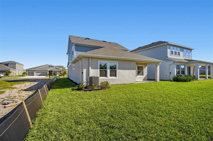Exterior details and patio area of a home in Waterset Tradition Series, Apollo Beach (Image 24).
