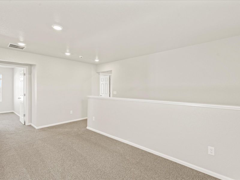 The Monarch floorplan interior image taken at a Meritage Homes community in Colorado Springs.