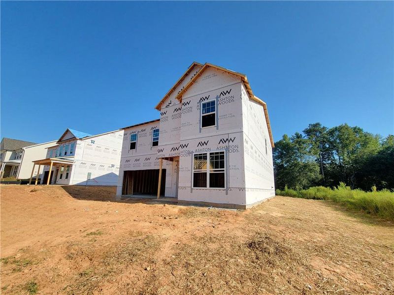 Front exterior of a new home in The Estates at Casteel, Bethlehem, GA, highlighting curb appeal (Image 13).