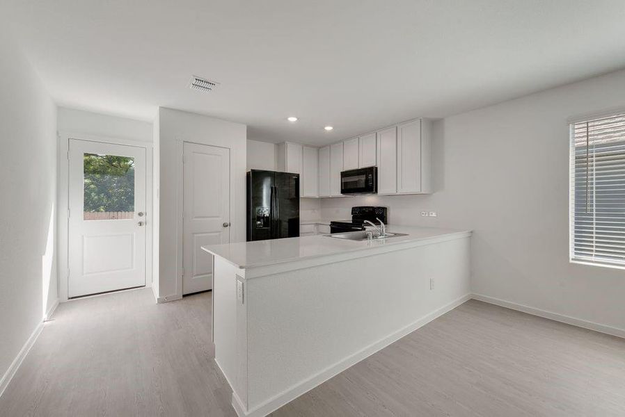 Furnished interior view inside a new home in Cottonwood, Wilmer (Image 3). Furnished interior view inside a new home in Cottonwood, Wilmer (Image 3).