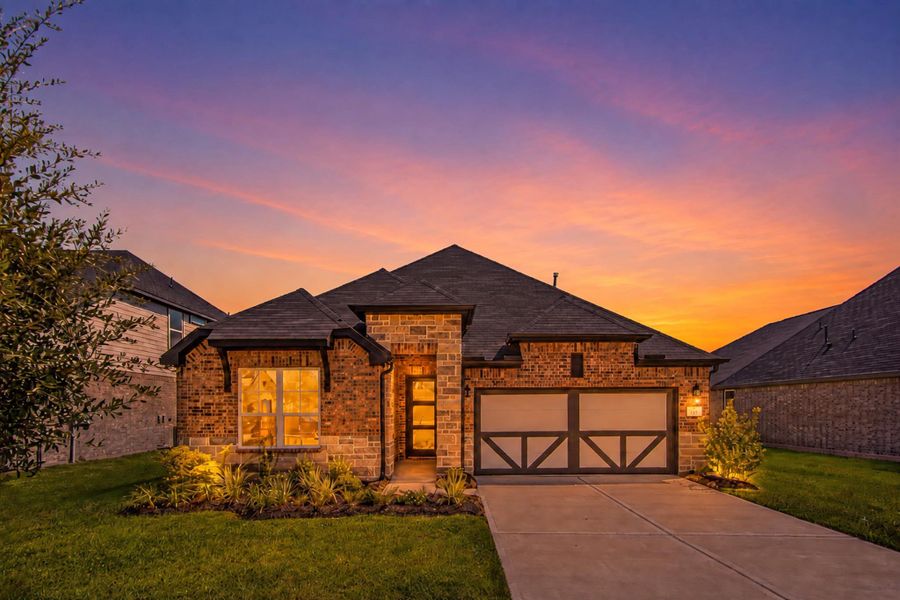 Front exterior of a new home in WaterStone, Montgomery, TX, highlighting curb appeal (Image 2). Front exterior of a new home in WaterStone, Montgomery, TX, highlighting curb appeal (Image 2).