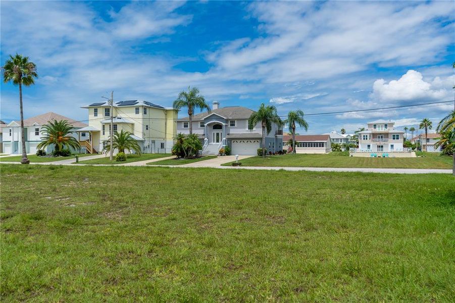 Front exterior of a new home in , Hudson, FL, highlighting curb appeal (Image 19).