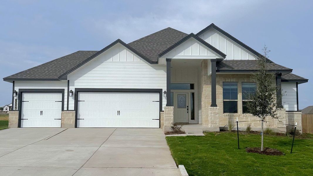 Front exterior of a new home in Sterling Meadows, Salado, TX, highlighting curb appeal (Image 1). Front exterior of a new home in Sterling Meadows, Salado, TX, highlighting curb appeal (Image 1).