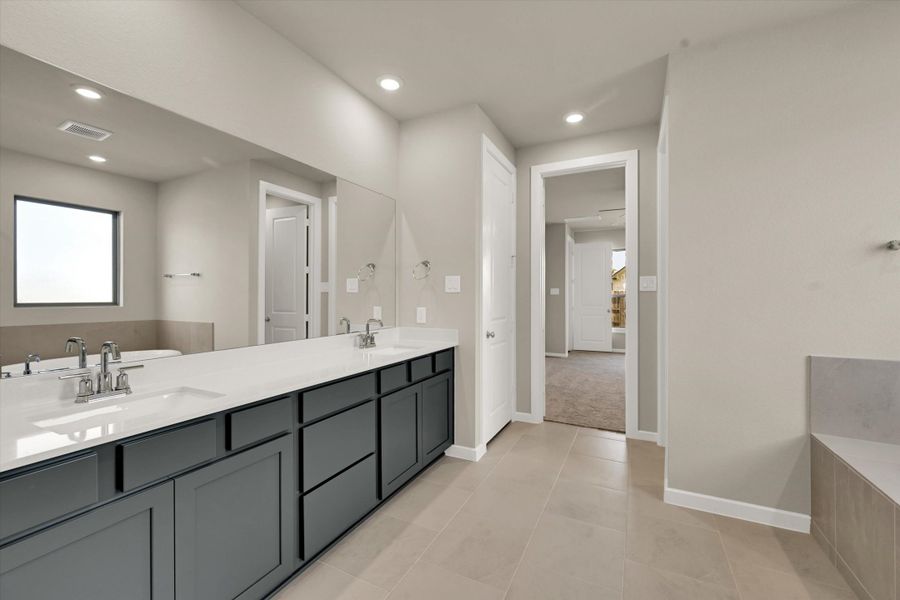 Furnished interior view inside a new home in Sunterra 50s, Katy (Image 15). Furnished interior view inside a new home in Sunterra 50s, Katy (Image 15).