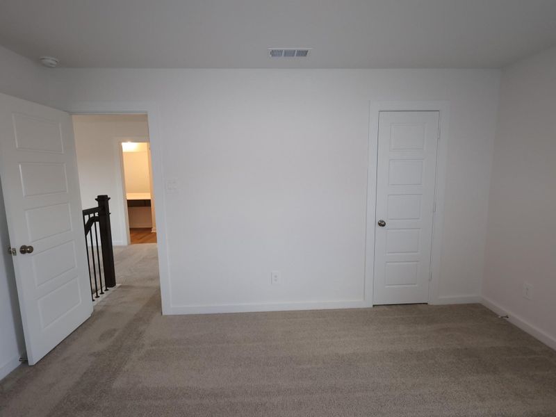 Spacious, unfurnished interior of a new home in Pinewood at Grand Texas, New Caney (Image 19).