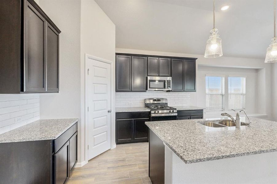 Furnished interior view inside a new home in Mobberly Farms, Pilot Point (Image 8). Furnished interior view inside a new home in Mobberly Farms, Pilot Point (Image 8).