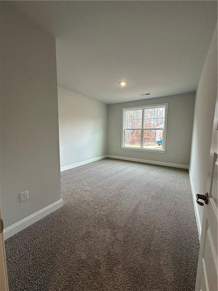 Spacious, unfurnished interior of a new home in Mirror Lake at South Harbour, Villa Rica (Image 22).