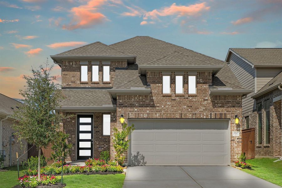 Front exterior of a new home in The Trails, New Caney, TX, highlighting curb appeal (Image 26). Front exterior of a new home in The Trails, New Caney, TX, highlighting curb appeal (Image 26).