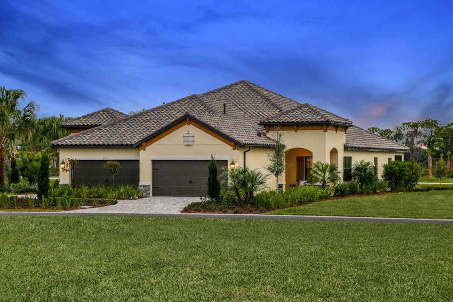 Representative exterior photo of a completed home built from the Tidewater 2 by Neal Communities in Vicenza, Venice, FL (Image 19).