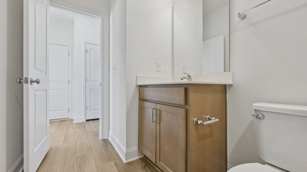Furnished interior view inside a new home in Sidney Creek Single Family, Zebulon (Image 31).
