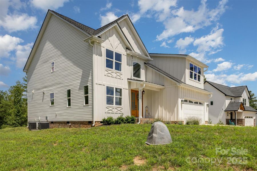 Front exterior of a new home in , Clover, SC, highlighting curb appeal (Image 1). Front exterior of a new home in , Clover, SC, highlighting curb appeal (Image 1).