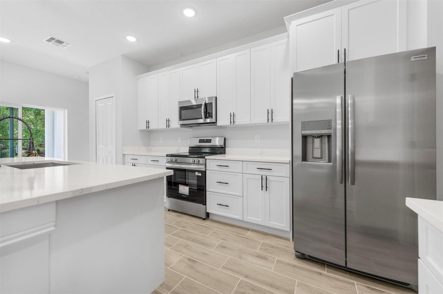 Furnished interior view inside a new home in , Vero Beach (Image 6).