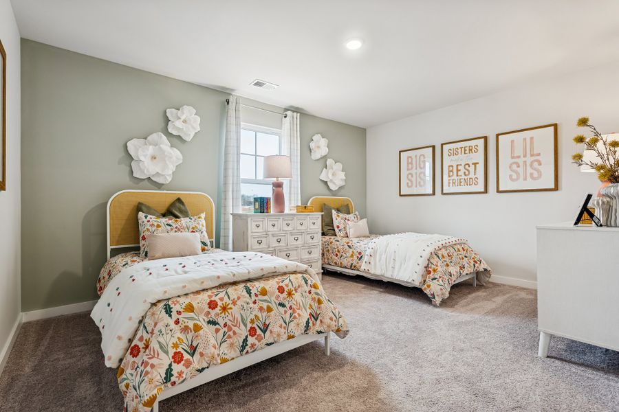 A bedroom with two beds. A bedroom with two beds.