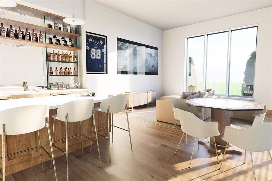 Indoor wet bar featuring light wood-type flooring, hanging light fixtures, and open shelves