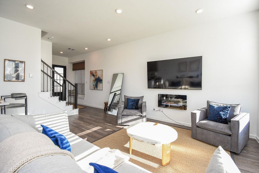 A closer look at the family room showcasing its functional layout and elegant decor.