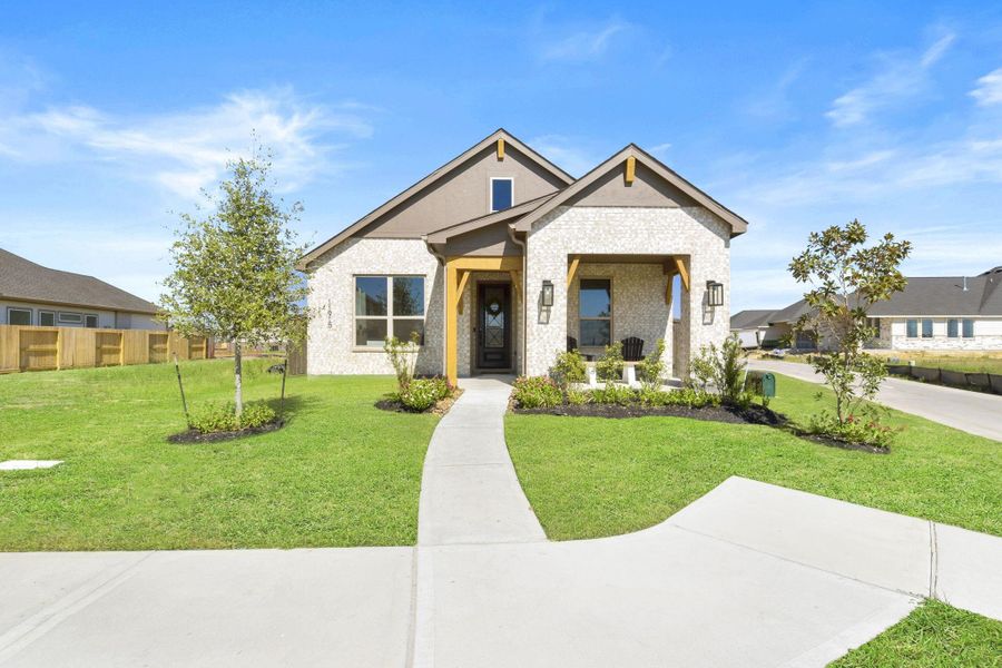 Front exterior of a home in the Riceland: 42ft. lots community, located in Mont Belvieu, TX (Image 10).
