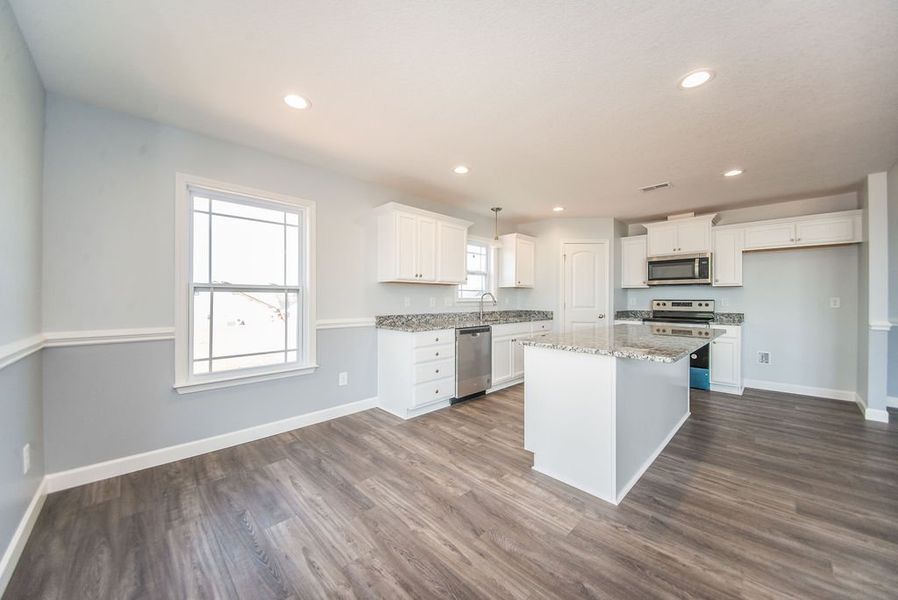 Representative furnished interior of a home built from the Franklin by Enchanted Homes in Guadalupe Heights, Seguin (Image 8).