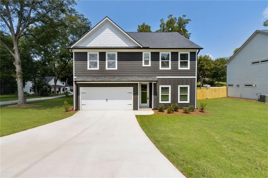 Front exterior of a new home in , Hoschton, GA, highlighting curb appeal (Image 1). Front exterior of a new home in , Hoschton, GA, highlighting curb appeal (Image 1).
