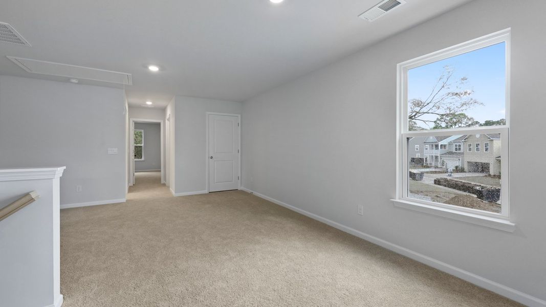 Representative unfurnished interior of a home built from the RUBY by D.R. Horton in Founders Corner, Summerville (Image 12).
