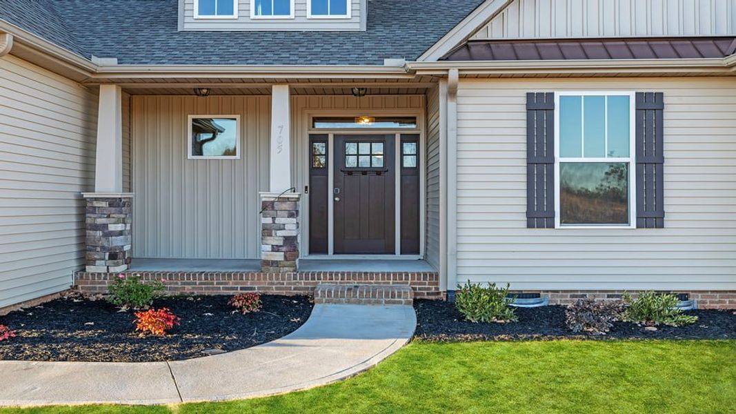 Exterior details and patio area of a home in Shadowood II, Seneca (Image 4).
