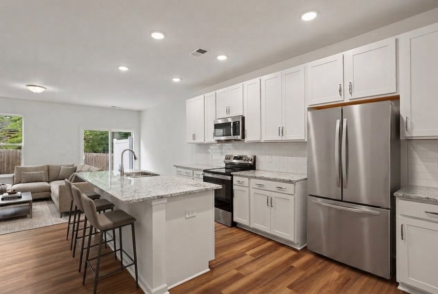Furnished interior view inside a new home in East Main Townes, Spartanburg (Image 7).