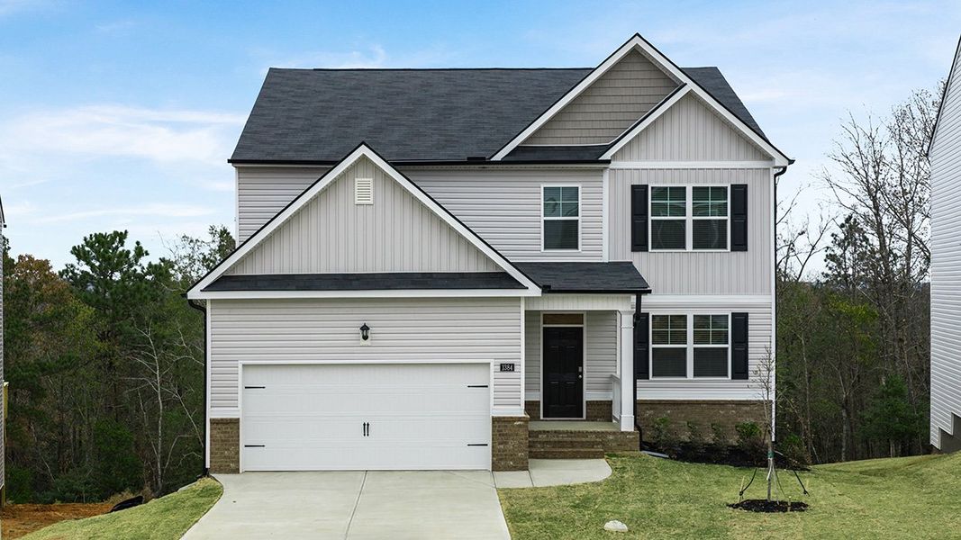 Front exterior of a new home in Captain's Corner, Grovetown, GA, highlighting curb appeal (Image 1). Front exterior of a new home in Captain's Corner, Grovetown, GA, highlighting curb appeal (Image 1).