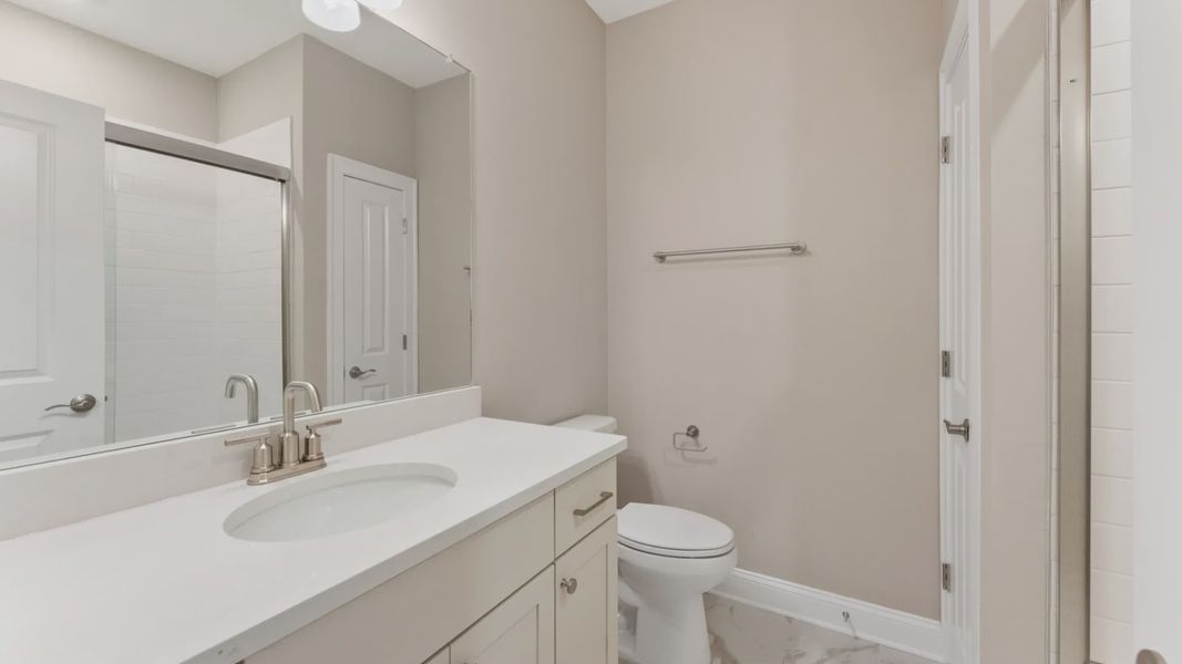 Furnished interior view inside a new home in The Courtyards at Bailey Farms, Dacula (Image 7).