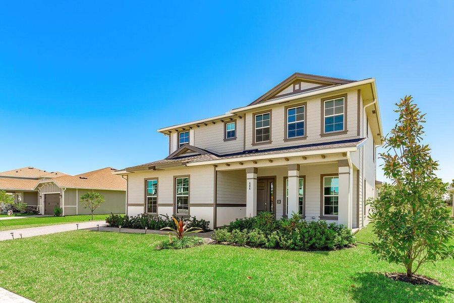 Front exterior of a new home in , Loxahatchee, FL, highlighting curb appeal (Image 24).