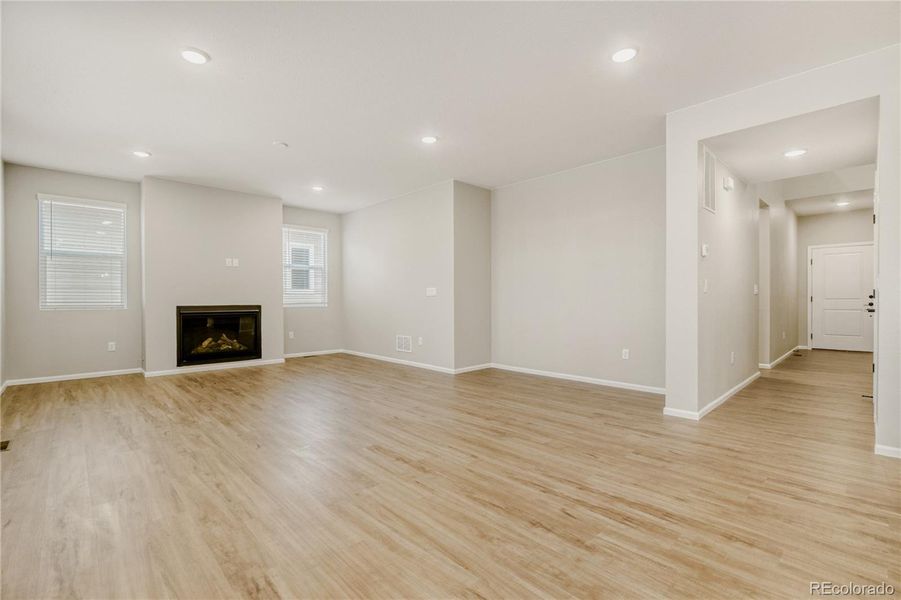 LVP throughout kitchen, living, dining