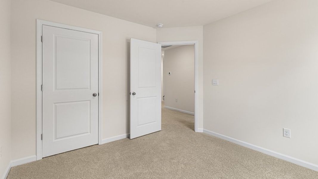 Spacious, unfurnished interior of a new home in The Townes at Honeycutt Oaks, Angier (Image 16). Spacious, unfurnished interior of a new home in The Townes at Honeycutt Oaks, Angier (Image 16).