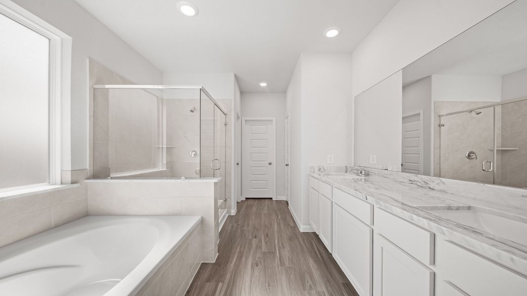 Representative furnished interior of a home built from the The Summit by Legend Homes in Bluestem, Brookshire (Image 8).