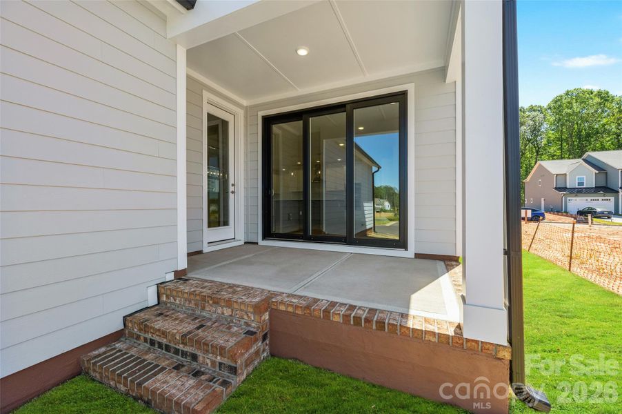 Exterior details and patio area of a home in The River District - Pioneer Collection, Charlotte (Image 3).