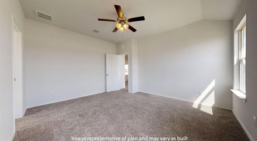 Carpeted room featuring a vaulted ceiling with a ceiling fan light fixture, white walls, and a window with a white sill Carpeted room featuring a vaulted ceiling with a ceiling fan light fixture, white walls, and a window with a white sill