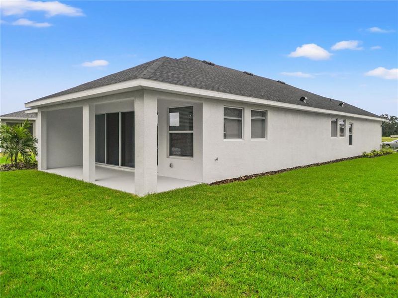 Exterior details and patio area of a home in , Parrish (Image 4).