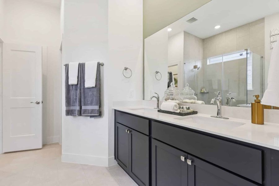 Furnished interior view inside a new home in Sunterra, Katy (Image 12).