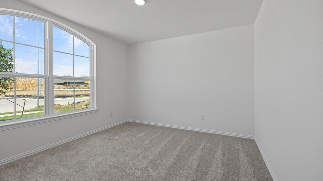 Furnished interior view inside a new home in Oakwood Estates, Waller (Image 7).