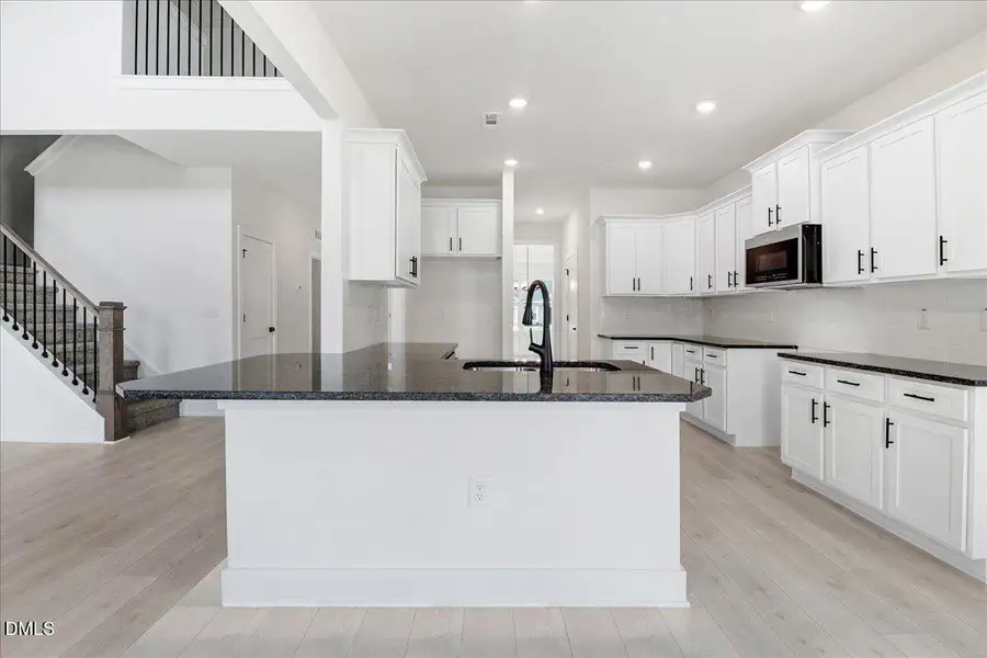 Furnished interior view inside a new home in Hidden Pines, Cameron (Image 3).