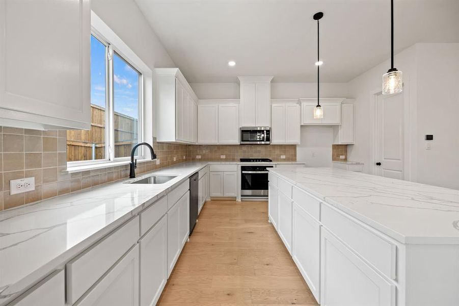 Furnished interior view inside a new home in North Square at Uptown, Celina (Image 10).