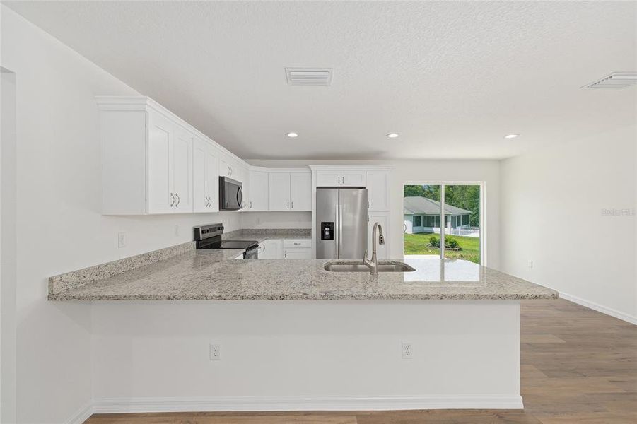 Furnished interior view inside a new home in , Dunnellon (Image 13).