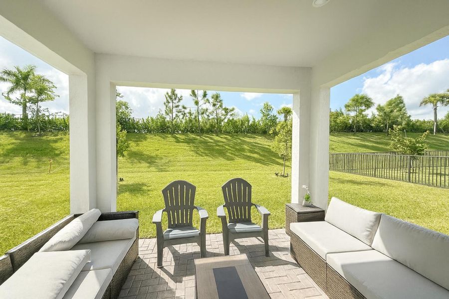 Exterior details and patio area of a home in Tradition - Cadence, Port St. Lucie (Image 4).
